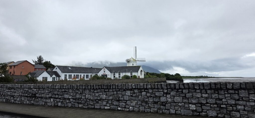 Windmill village behind a stone wall, Ireland, 2025