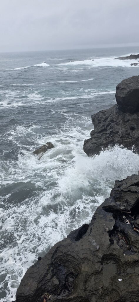 Waves on black rock, Ireland, 2025