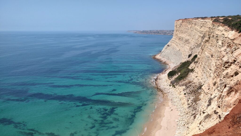 White cliff and turquoise shallows, Portugal, 2024