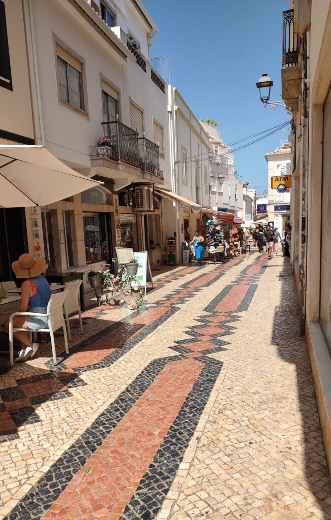 Patterned pavement street, old town, Portugal, 2024