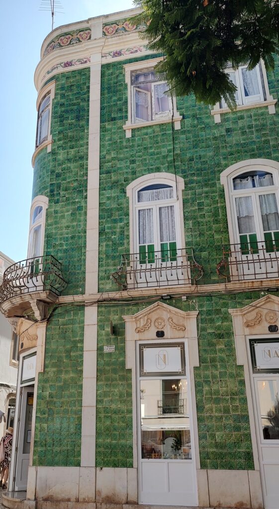 Green tiled building, Portugal, 2024